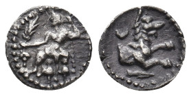 LYCAONIA. Laranda. (4th century BC). AR Obol
Obv: Baaltars seated left, holding grain ear, grapes and sceptre.
Rev: Forepart of wolf right; crescent...