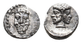 CILICIA. Uncertain. (4th century BC). AR Hemiobol.
Obv: Triform bearded male head.
Rev: Janiform head; on the left, a bearded male; on the right, a ...