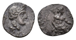 CILICIA. Uncertain. (4th century BC). AR Obol.
Obv: Helmeted head of Athena right.
Rev: Baaltars seated right on throne, holding eagle and lotus-tip...