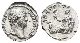 HADRIAN, 117-138 AD. AR, Denarius. Rome.
Obv: HADRIANVS AVG COS III.
Bare head of Hadrian, right.
Rev: AEGYPTOS.
Egypt reclining left, holding sis...