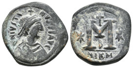 JUSTIN I, 518-527 AD. AE, Follis. Nikomedeia. 2nd officina.
Obv: DNIVSTI-NVSPPAVC
Bust of Justin I facig right with diadem, cuirass, and paludamentu...