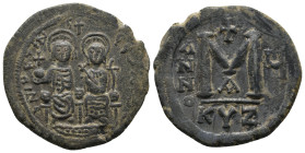 JUSTIN II, 565-578 AD. AE, Follis. Kyzikos. 1st officina. Dated RY 5 (569-570).
Obv: D N IЧSTIN–S P P S AЧSS (Ч and P retrograde)
Justin II and Soph...