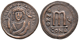 TIBERIUS II CONSTANTINE, 578-582 AD. AE, Follis. Constantinople. 1st officina. Dated RY 5 (582/583).
Obv: D m TIb CONSTANT P P AVI.
Frontal bust of ...