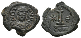 Maurice Tiberius, 582-602 AD. AE, Decanummium. Constantinople.
Obv: D N TIB[ER] P P AV.
Crowned, draped, and cuirassed bust facing.
Rev: Large I; c...