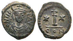 Maurice Tiberius, 582-602 AD. AE, Decanummium. Constantinople.
Obv: D N TIB[ER] P P AV.
Crowned, draped, and cuirassed bust facing.
Rev: Large I; c...