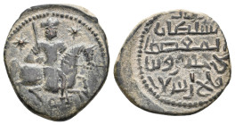 Islamic. Seljuks. Rum. GHIYATH AL-DIN KAY KHUSRAW I bin Qilich Arslan. Second reign, 1204-1211 AD / 601-608 AH. AE, Fals.
Obv: Warrior, head facing a...