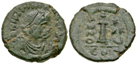 "Justinian I. 527-565. AE decanummium (17.9 mm, 4.17 g, 7 h). Constantinople mint, struck 561/2. D N IVSTINIAN[VS P F AVG] (or similar), diademed, dra...