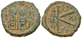 "Justin II. 565-578. AE half follis (20 mm, 5.15 g, 6 h). Thessalonica mint, struck 569/570. Justin II and Sophia seated on throne facing, both nimbat...