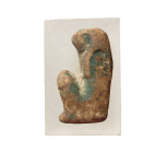 "An Egyptian faience inlay of Ra, 3rd Intermediate Period, ca. 1075 - 664 B.C. , frontally molded with falcon head and long wig, remnants of blue-gree...