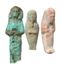 "A group of three Egyptian ushabtis. Lot includes a 3rd Intermediate type, Dynasty 21, ca. 1075 - 945 B.C. ., with light turquoise glaze, H: 3 1/8 in....