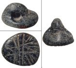 "A chlorite stamp seal, Syria/Mesopotamia, Chalcolithic period, 5th - 4th Millennium B.C. , oval shaped with loop handle, the base incised with rudime...