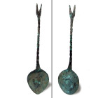 "A Medieval bronze spoon with forked handle, Egypt, ca. 11th - 13th Century A.D. , the middle of the handle twisted tightly. L: 7 5/8? (19.4 cm). Inta...