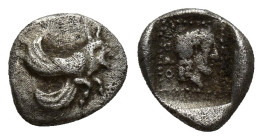 Dynasts of Lycia. Uncertain mint. circa 470-440 BC. Obol AR (9mm, 0,8 g). Forepart of winged man-headed bull right / OFOV, male head right within dott...
