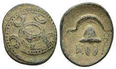 Kings of Macedon. Anonymous, after 311 BC. Æ (19mm, 3.8 g). Macedonian shield, in centre head of Herakles in lionskin. R/ Macedonian helmet; monogram ...