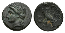Caria, Halikarnassos, ca. 4th-3rd cent. BC, AE (11mm, 1.3 g) Laureate head of Apollo left Eagle standing left, wings spread, lyre in front