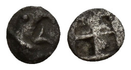 Ionia, Phokaia, late 6th century BC. AR Tetartemorion (6mm, 0.3 g). Head of griffin r. R/ Quadripartite incuse square.