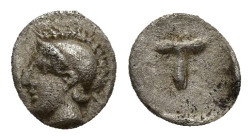 Greek coin (6mm, 0.2 g) helmeted male head left / Rev: T