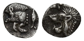 Mysia. Kyzikos circa 480 BC. Hemiobol AR (7mm, 0,2 g). Forepart of boar to left, to right, tunny fish swimming upwards / Head of lion to left within i...