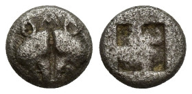 Lesbos, Unattributed early mint, c. 550-480 BC. BI 1/12 Stater (9mm, 1.1 g).. Confronted boars’ heads; AV monogram above. R/ Shallow quadripartite inc...