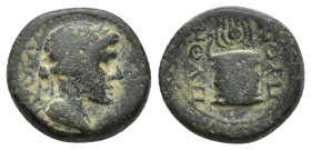 Phrygia, Laodikeia, c. 1st century BC. Æ (14mm, 4 g). Laureate head of Apollo r.; lyre before. R/ Altar with serpent; headdress of Isis above.