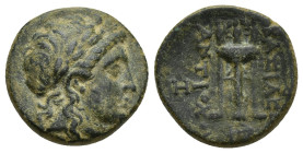 SELEUKID KINGS of SYRIA. Antiochos II Theos. 261-246 BC. Æ (17mm, 4.1 g). Sardes mint. Laureate head of Apollo right / Tripod; anchor below; H to left...