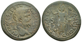 PISIDIA, Antiochia. Septimius Severus. AD 193-211. Æ (33mm, 28.4 g). Laureate head right / Mên standing facing, head right, foot on bucranium, holding...
