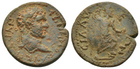 Caracalla (198-217). Pamphylia, Sillyum. Æ (24mm, 8.4 g). Laureate head r. R/ Mên standing r., wearing Phrygian cap, foot on bucranium, holding pine c...