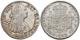 CARLOS IV (1788-1808). 8 Reales. (Ar. 26,93g/40mm). 1807. México TH. (Cal-2019-986). EBC. Rozadura en anverso. Restos de brillo original. Bonito ejemp...