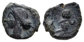 Hispanic-Carthaginian Coinage. 1/4 calco. 220-215 BC. Cartagena (Murcia). (Abh-523). (Acip-586). Anv.: Head of Tanit left. Rev.: Helmet. Ae. 1,75 g. C...