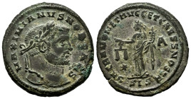 Galerius. Follis. 286-305 AD. Siscia. (Ric-135b). Anv.: MAXIMIANVS NOB CAES, Laureate head right. Rev.: SACRA MONET AVG ET CAESS NOSTR, Moneta standin...
