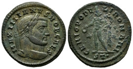 Galerius. Follis. 298-299 AD. Ticinum. (Ric-35b). Anv.: MAXIMIANVS NOB CAES, laureate head of Maximianus Herculius right. Rev.: GENIO POPVLI ROMANI. G...