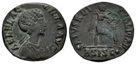 Aelia Flacilla. Maiorina. 383-388 d.C. Siscia. (C-4). Rev.: SALVS REI PVBLICAE / ASISC. Victoria seated right painting a Christogram on shield. Ae. 4,...