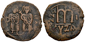 Phocas with Leontia. Follis. Año 1 = 602/3 d.C. Cyzicus. (Doc-69a). (Mib-75). (Sear-664). Anv.: (O M FOCA E) P P A(VG). Phocas, holding globus crucige...