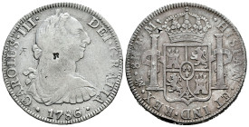 Charles III (1759-1788). 8 reales. 1786. Mexico. FM. (Cal-1129 var). Ag. 26,61 g. Chop marks. Choice F. Est...50,00. 

Spanish description: Carlos I...
