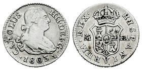 Charles IV (1788-1808). 1/2 real. 1803. Madrid. FA. (Cal-265). Ag. 1,44 g. Choice F. Est...18,00. 

Spanish description: Carlos IV (1788-1808). 1/2 ...