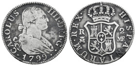 Charles IV (1788-1808). 2 reales. 1799. Madrid. MF. (Cal-607). Ag. 5,76 g. Choice F/Almost VF. Est...30,00. 

Spanish description: Carlos IV (1788-1...