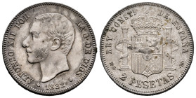 Centenary of the Peseta (1868-1931). Alfonso XII (1874-1885). 2 pesetas. 1882*18-82. Madrid. MSM. (Cal-32). Ag. 9,97 g. Minor scratches on edge. Choic...