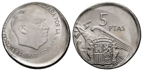 Estado Español (1936-1975). 5 pesetas. 1957. Madrid. 5,76 g. Striking error. important displacement. Mint state. Est...40,00. 

Spanish description:...
