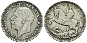 Great Britain. George V. 1 crown. 1935. (Km-842). Ag. 28,15 g. Almost VF/VF. Est...30,00. 

Spanish description: Gran Bretaña. George V. 1 crown. 19...