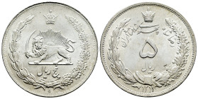 Iran. 5 rials. 1311 H (1932). (Km-1131). Ag. 24,96 g. AU. Est...40,00. 

Spanish description: Irán. 5 rials. 1311 H (1932). (Km-1131). Ag. 24,96 g. ...