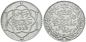 Morocoo. Abd Al-Hafiz. 1 rial. 1329 H (1911). Paris. (Km-Y52). Ag. 24,85 g. VF. Est...35,00. 

Spanish description: Marruecos. Abd Al-Hafiz. 1 rial....