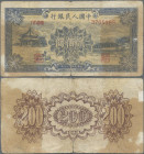 China: Peoples Bank of China, second series 1949, 200 Yuan, P.841, genuine note from an old collection, toned paper with remnants of tape on back, bor...