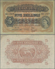 East Africa: The East African Currency Board 5 Shillings 1957, P.33e, still nice condition with strong paper and bright colors, vertically folded, sma...