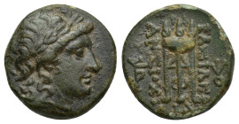Seleukid Kingdom. Antiochos II Theos. 261-246 B.C. Æ (16mm, 4 g). Sardes. Laureate head of Apollo right / [Β]ΑΣΙΛΕΩΣ ΑΝΤΙΟΧΟΥ, tripod; in outer fields...