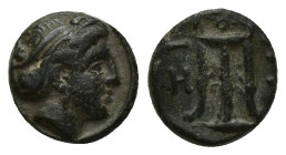 Mysia, Kyzikos. Third century B.C. AE (10 mm, 1.4 g). Head of Kore Soteira right, hair bound in sakkos / KY-ZI, tripod.
