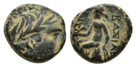 Seleukid Kings of Syria. Antiochos III (222-187 BC). Æ (10mm, 2 g). Sardis. Laureate head of Apollo r. R/ Apollo seated l. on omphalos, holding arrow ...