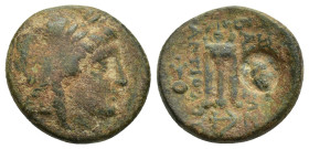 SELEUKID KINGDOM. Antiochos II Theos (261-246 BC). Ae. (16mm, 4.2 g) Sardes. Obv: Laureate head of Apollo right. Rev: BAΣΙΛΕΩΣ / ANTIOXOY. Tripod. Con...