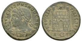 Crispus (Caesar, 316-326). Æ Follis (18mm, 2.9 g). Rome, 326. Laureate, draped and cuirassed bust l. R/ Camp-gate with no doors and two turrets, star ...