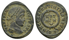 Constantine I Æ Nummus. (19mm, 3.1 g) Ticinum, AD 320-321. CONSTANTINVS AVG, laureate head right / D N CONSTANTINI MAX AVG, VOT XX within wreath; P T ...