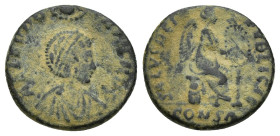 Aelia Eudoxia, wife of Arcadius. Constantinople, circa AD 401-405 Follis, (16mm, 2.9 g) Æ AEL EVDO-XIA AVG, diademed draped bust right being crowned b...